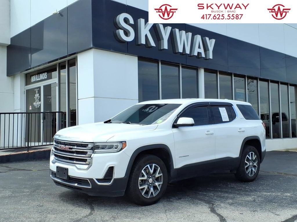 2023 GMC Acadia SLE in Summit White — front three-quarter view