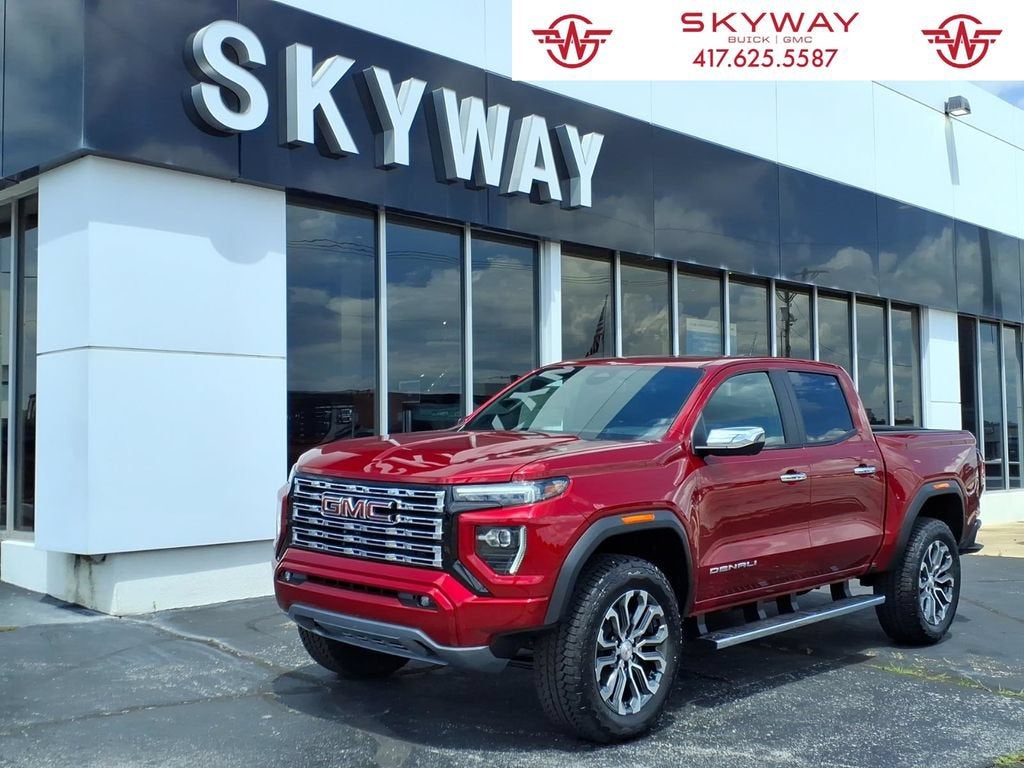 2026 GMC Canyon Denali in Volcanic Red Tintcoat — front three-quarter view