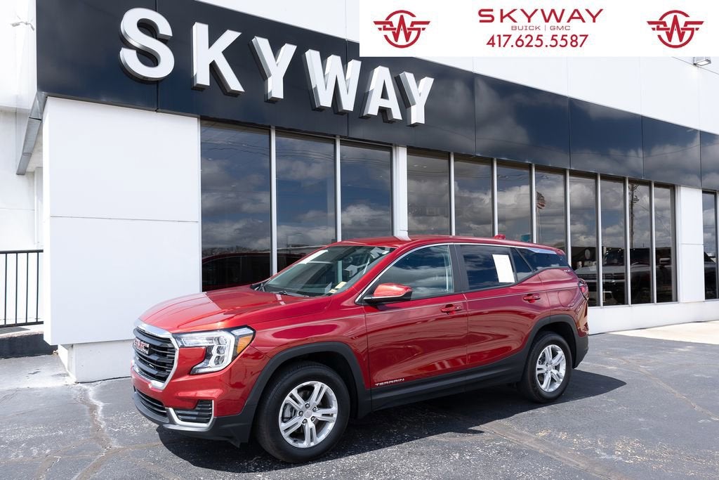 2024 GMC Terrain SLE in Volcanic Red Tintcoat — front three-quarter view