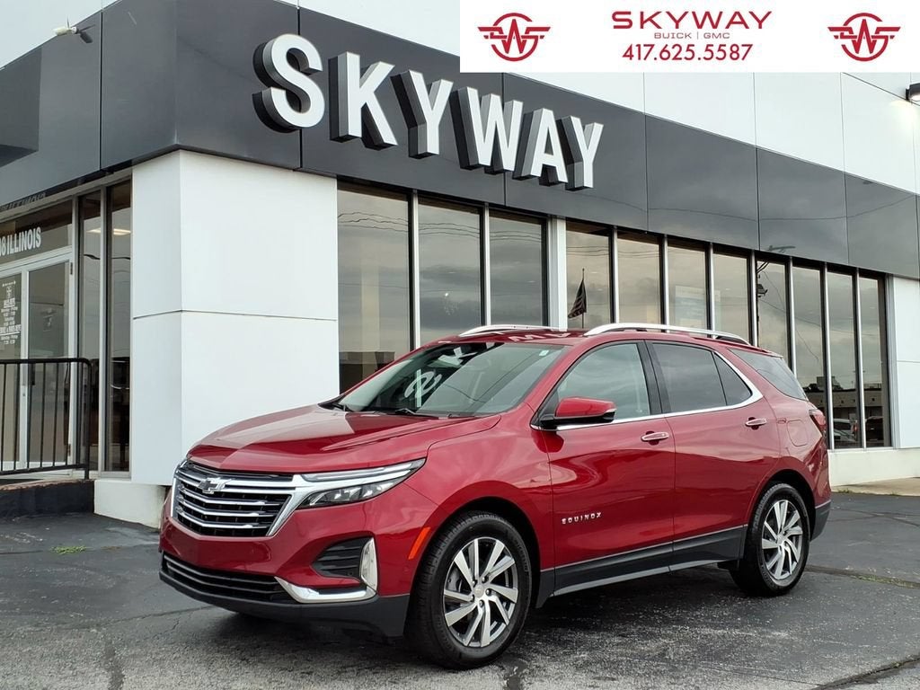 2024 Chevrolet Equinox Premier in Radiant Red Tintcoat — front three-quarter view