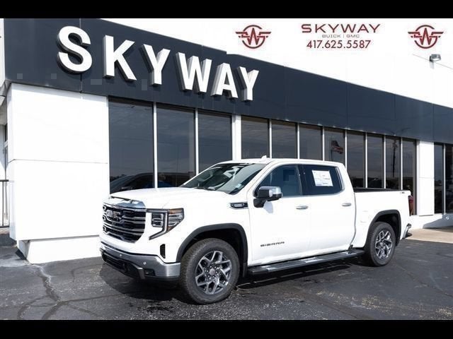 2026 GMC Sierra 1500 SLT in Summit White — front three-quarter view