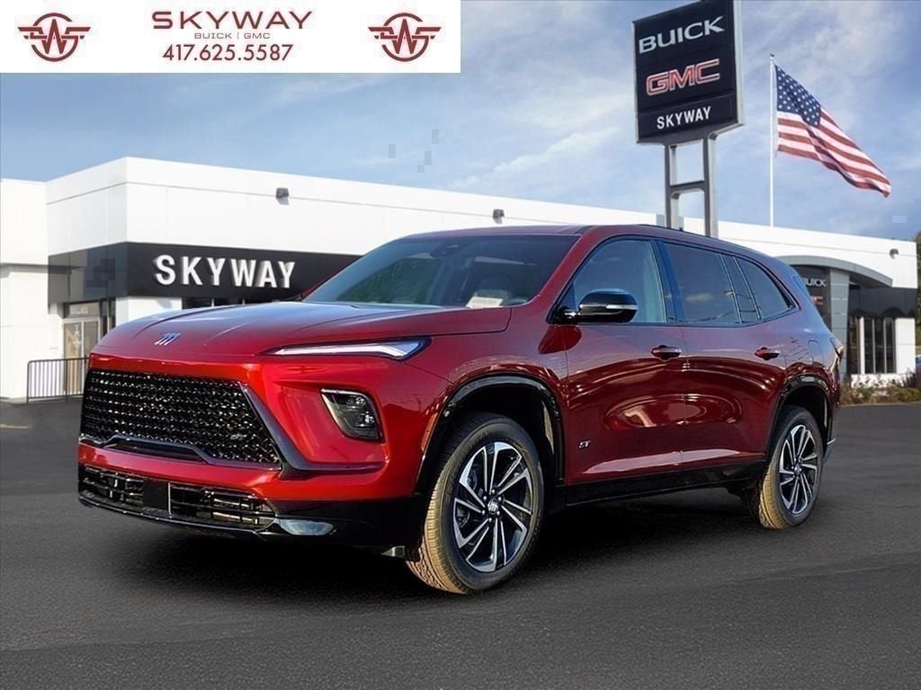 2026 Buick Enclave Sport Touring in Cherry Red Tintcoat — front three-quarter view