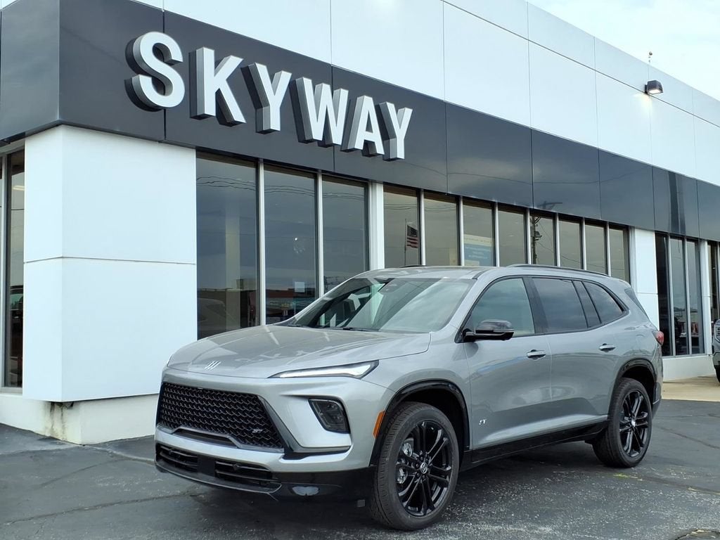 2026 Buick Enclave Sport Touring in Moonstone Gray Metallic — front three-quarter view