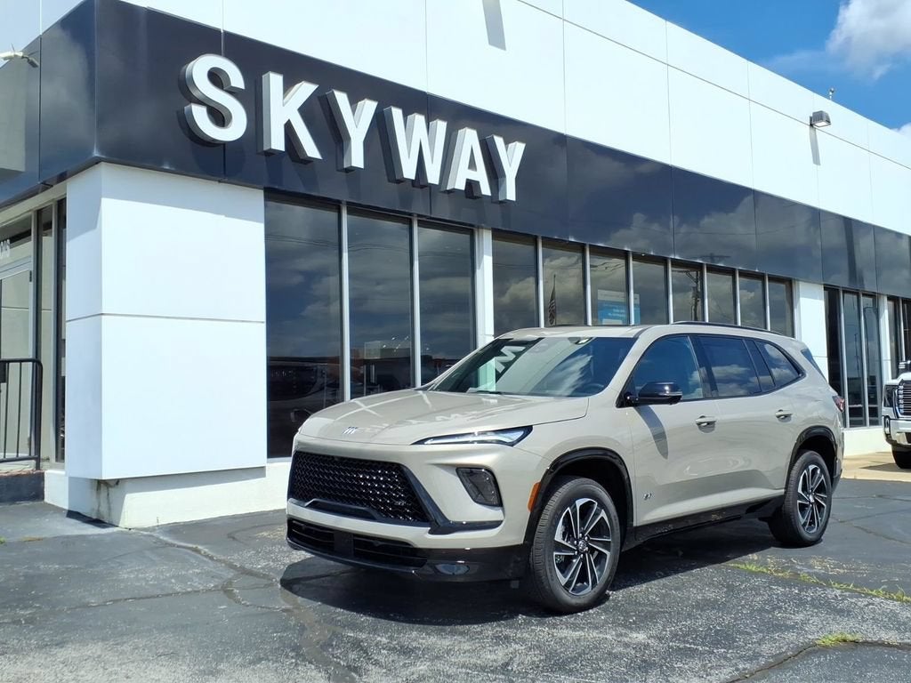 2026 Buick Enclave Sport Touring in Stone Metallic — front three-quarter view