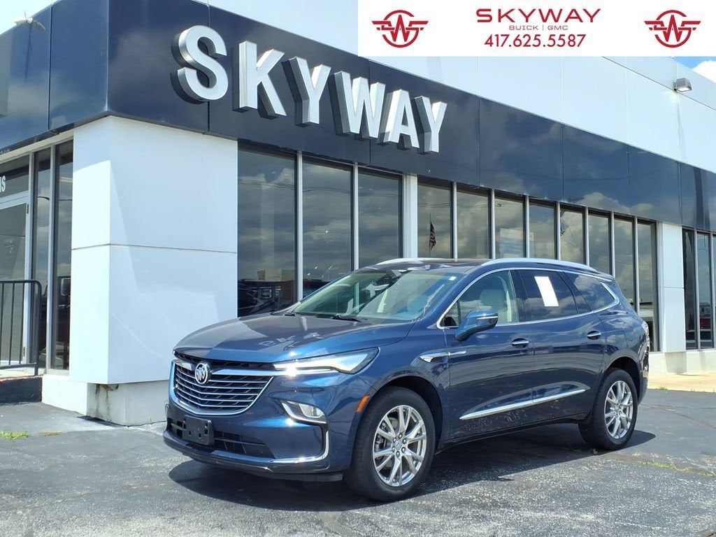 2023 Buick Enclave Essence in Emperor Blue Metallic — front three-quarter view