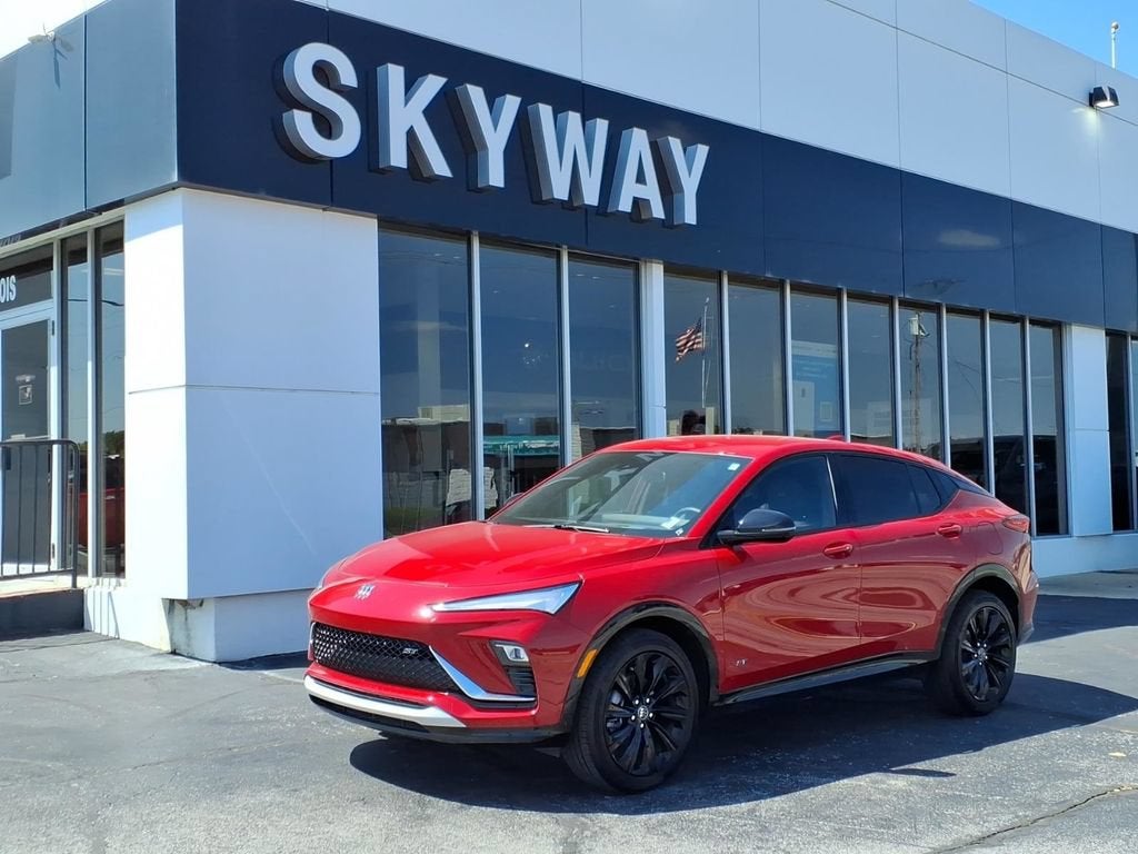 2026 Buick Envista Sport Touring in Brilliant Red — front three-quarter view